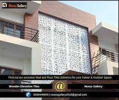 Wooden Elevation Tiles Find Out Our Exclusive Wall And Floor Tiles Solutions For Your Indoor Ou Wooden Tile Elevation Tiles Outdoor Wall Wall And Floor Tiles