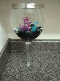 We did not find results for: I Used An Oversized Wine Glass And Put A Beta In It I Added White Marbles And Swarovski Crystal Beads Wine Glass Decor Glass Fish Tanks Oversized Wine Glass