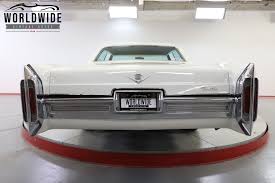 Image result for Starlight Silver 1966 Cadillac