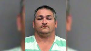 Florida prison employees with Klan ties arrested in murder plot