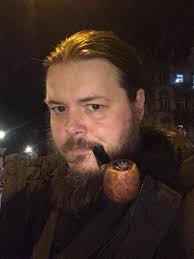 Ed Lapiz and Big Brew owner Rolando Garcia left the group