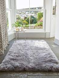 Discover a range of fluffy rugs for bedrooms at kogan.com and buy one for less. Large Luxurious Sheepskin Rug Light Grey Rugs In Living Room Contemporary Home Furniture Sheepskin Rug
