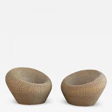 This inviting swivel chair beckons you to take off your shoes and snuggle into the round chair. Isamu Kenmochi Rattan Round Chairs By Isamu Kenmochi