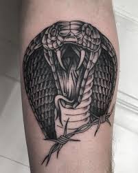 Check spelling or type a new query. Black Work Snake Tattoo On The Leg Cobra Tattoo Snake Tattoo Design Snake Tattoo