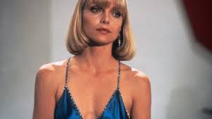 Elvira hancock is a woman who goes from being the girlfriend of one gangster (robert loggia) to the wife of another when tony takes even with these credentials, patricia was humble and gave credit for the longevity of the costumes in scarface to michelle pfeiffer as well as the producers and director. Michelle Pfeiffer S Blue Dress In Scarface Vogue Paris