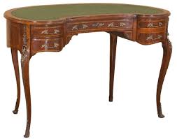 Solid mahogany tables, of a timeless beauty. Casa Padrino Luxury Baroque Desk Dark Brown Light Brown Green Handmade Mahogany Desk With 5 Drawers Noble Baroque Office Furniture
