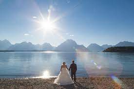 Have A Stunning Lake And Mountain Wedding In Grand Teton National Park Heathererson Mountainwedding Mountain Wedding Venues Mountain Wedding Iconic Weddings