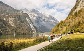 On the way to the first stop, the boatman blows a blast on his trumpet, to showcase the beautiful echoes that bounce back from the mountain walls. Am Obersee Entlang Von Salet Zur Fischunkelalm