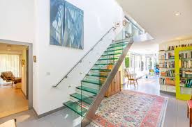 Instead of being made with vertical posts of glass like you might see with wood or metal railings, glass railings are usually made with panes of glass. 75 Beautiful Glass Staircase Pictures Ideas April 2021 Houzz
