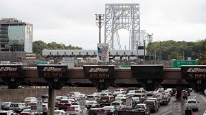 The queens midtown tunnel dedicates three of its four lanes to inbound traffic during morning rush hour with an hov lane created using a movable concrete barrier. Lincoln Tunnel Cbs New York