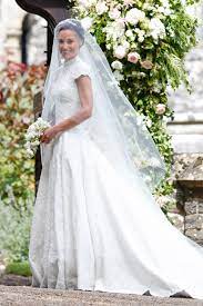 Schon länger hält sich hartnäckig das gerücht, die ehemalige first lady würde bei öffentlichen auftritten ein double nutzen. Ikonischste Brautkleider 2018 Vogue Germany