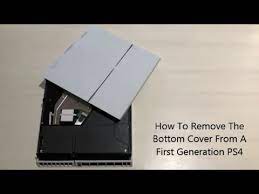 Start by grabbing near the playstation logo at the rear of the console, then pull the corner outward. How To Remove The Bottom Cover From A First Generation Ps4 Youtube