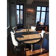 A reclaimed wood table top is sure to add character to your dining room without breaking the bank. Restoration Hardware Aero Reclaimed Wood Dining Table Chairish