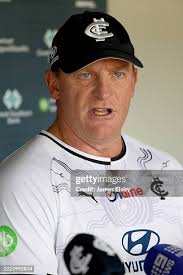 Players warm up during a Carlton Blues AFL training session at Unley...  News Photo