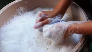 Wash your clothes in warm, soapy water then rinse them under the tap. Female Hands Washing Clothes In Stock Footage Video 100 Royalty Free 1022203054 Shutterstock