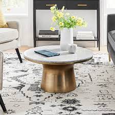 Makes a modern statement outdoors. Marble Topped Pedestal Coffee Table