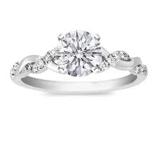 Pin By Courtney Boone On Gettin Hitched Round Diamond Engagement Rings Twisted Band Engagement Ring Pave Band Engagement Ring