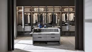 Hanging clothes storage and open shelves are probably only things you need in a fully mirror doors of the wardrobes will help to visually enlarge the space reflecting the light. Designer Walk In Wardrobes Molteni C