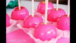 Allow any excess syrup to drip back into the pan, then place the apple on the prepared cookie sheet. Neon Hot Pink Diy Candy Apples Tutorial Sweethaute Youtube