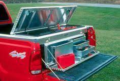 tool storage system rolls on rails from truck cab to gate truck bed storage truck tools truck storage