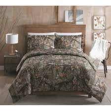 Three decorative pillows give added value to this collection, which is tied together with a dark blue bedskirt. Realtree All Purpose Camo Comforter Set With Sheet And Curtain Option Comforters Bedding Sets Bedding