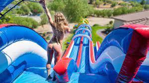 When we think about slipping and sliding, we often think of icy winters. World S Largest Backyard Waterslide 100ft Youtube