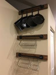 Hanging Cast Iron Pans And Produce Baskets Homeimprovementcast Iron Storage Produce Baskets Home Improvement