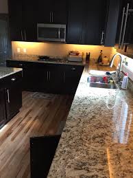 Led Lighting Kitchen Dark Espresso Cabinets And Santa Cecilia Granite Countertops Dark Granite Countertops Espresso Cabinets Dark Kitchen Cabinets