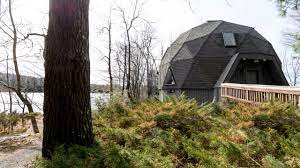 Notable — that's a good description of many monolithic dome homes. A Rare Buckminster Fuller Geodesic Dome House Gets A Bright And Modern Makeover Architectural Digest