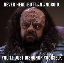 From the episode The Chase: A Klingon named Nu'daq challenged Data to the  B'aht Qul. A test of strength I guess. He ended up knocked the fu*k out. As  Data tells him