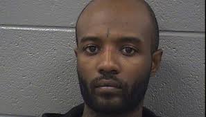 Man charged after gun goes off in Megabus bathroom