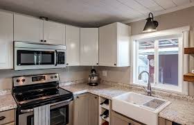 1979 Double Wide Transforms Into Cozy Farmhouse Retreat In 2020 Mobile Home Renovations Mobile Home Kitchens Manufactured Home Remodel