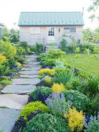 Small garden ideas are not exclusively for those living in the city or those with small spaces to spare for a garden. Sunny Landscape Ideas Better Homes Gardens
