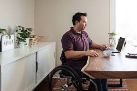 Asian Man In Wheelchair In Home Office By Preappy For Stocksy United Home Office Home Asian Men