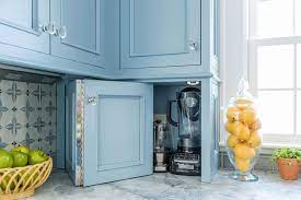 Sophia & william storage cabinet with 2 doors, accent display storage organizer distressed console cabinet with wooden frame and carved finch homecho farmhouse storage cabinet sliding barn door buffet cabinet, accent kitchen sideboard coffee bar, adjustable shelves, white. Folding Blue Cabinet Doors To Small Appliances Cabinet Transitional Kitchen