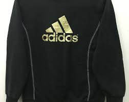 Black And Gold Adidas Zip Up Hoodie 90 S Vintage Adidas Sweatshirt Black Gold Logo Adidas Jumper Pullover Size L For Women S330 Adidas Jumper Adidas Sweatshirt Black Sweatshirts