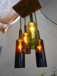 Lampara Colgante Con Botellas De Vino Buscar Con Google Arana De Botellas De Vino Lamparas De Botellas De Vino Lamparas Colgantes