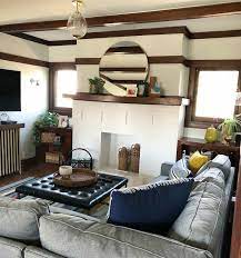 A new build craftsman style home with large windows this living room is both glamorous and inviting with comfortable oversized seating and metallic details. How To Make A Craftsman Living Room Update Diy Hometalk