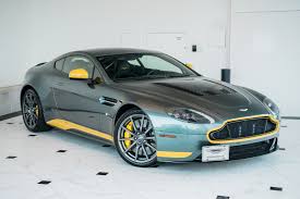 Image result for Sunburst Yellow 2017 Aston Martin