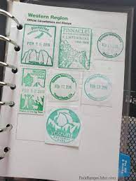 The passport book contains maps, photographs, park information, and spaces to collect the series of stamps issued each year. Epic Guide To National Park Passport Books Park Ranger John