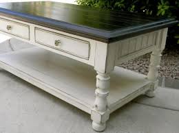 This coffee and end table set from ashley furniture has a contemporary style with a little bit of everything from urban industrial to driftwood beachy. Love This Table Stained Top Off White Distressed Sides Lower Shelf Would Be Perfect Little Bi Coffee Table Refinish Painted Coffee Tables Redo Furniture