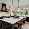 Dark gray cabinets and white spring granite countertops matched very well. 1