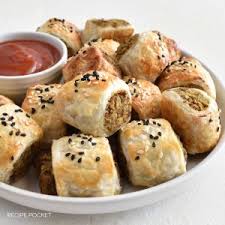 To make the sausage rolls, roll out the dough and cut it into strips. Easy Puff Pastry Sausage Rolls Make 48 Gourmet Rolls