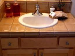 This one is even cheaper than soapstone bathroom countertop. The Large Tiles For A Counter Top Create An Uneven Surface Texture Bathroom Countertops Countertops Diy Countertops