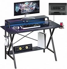 As one of the best reviewed gaming desks on amazon, the desino computer desk is not only affordable but reliable as well. Amazon Com Sedeta Gaming Desk 47 Gamer Desk Computer Desk With Usb Port And Power Outlet Gaming Table Gaming Workstation Desk With Pc Stand Shelf Cup Holder Headphone Hook Home Office Desk