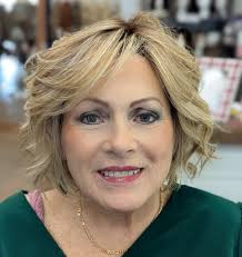 Wigs can be customized for you! She loved the wig, but wanted more curl!  Isn't she gorgeous 🤩 This is a synthetic, heat friendly wig!