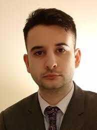 Fed says Trump tariffs will dent the economy