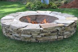 Pin By Justine Downing On Want To Decorate Fire Pit Landscaping Landscaping With Rocks River Rock Landscaping
