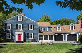 Bold and blue louvered shutters with shutter dogs. Blue House Black Shutters Houzz