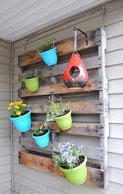 Got An Old Bundt Pan Lying Around You Should Totally Do This In Your Garden Vertical Pallet Garden Pallets Garden Pallet Garden
